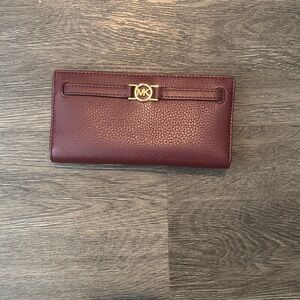 Michael Kors Wine Pebbled Leather Continental Wallet with Gold MK Accent